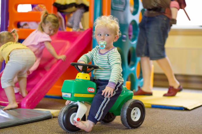 Baby on Ride-On Toy at Corvallis Indoor Park